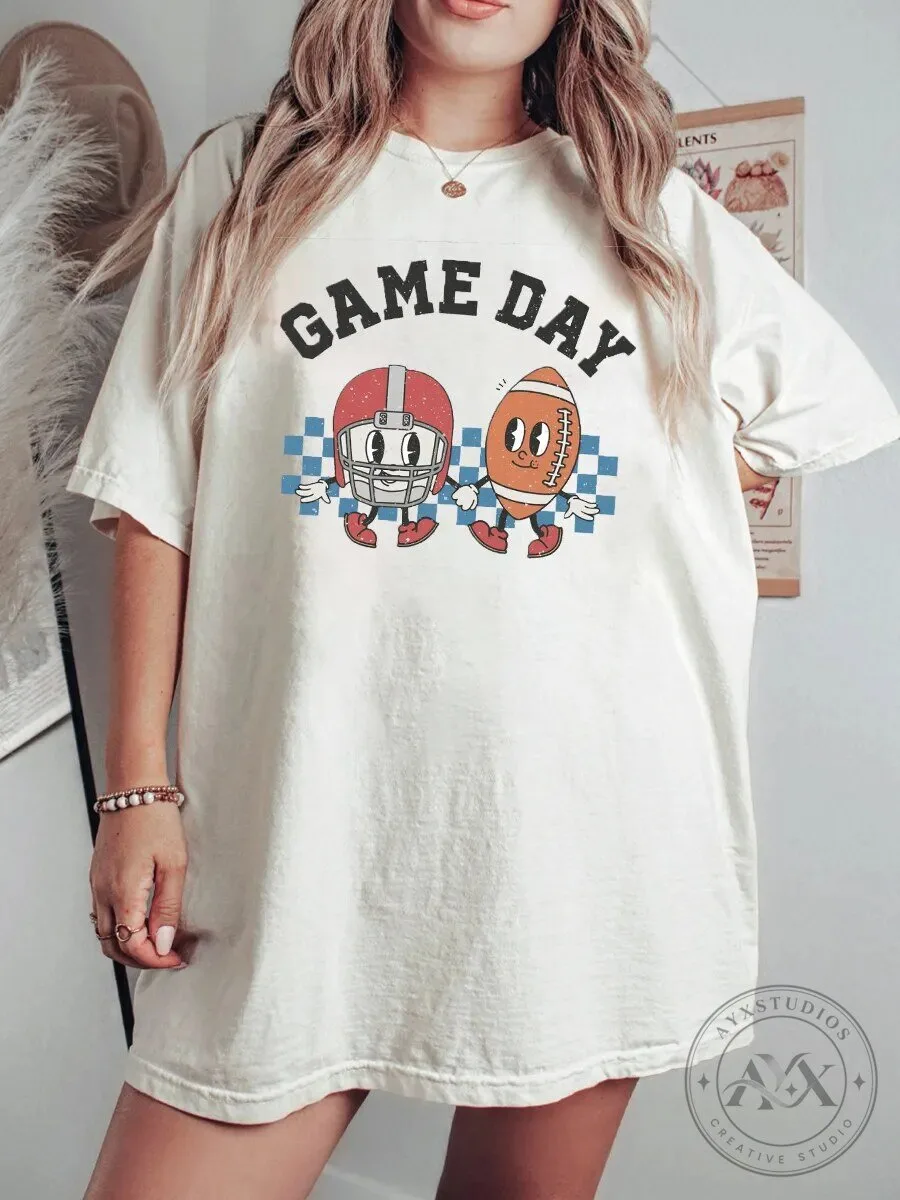 Game Day Football Helmet and Ball Cartoon Graphic Short Sleeve T-Shirt